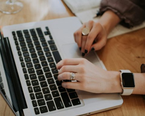 person using MacBook