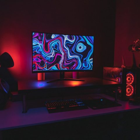 black flat screen computer monitor turned on near black computer keyboard