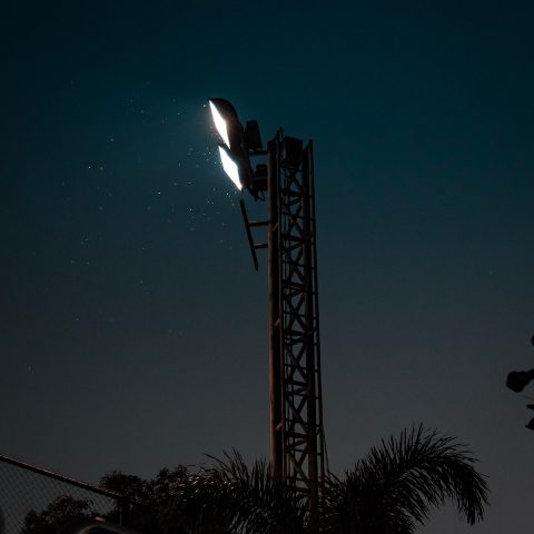 a street light is lit up at night